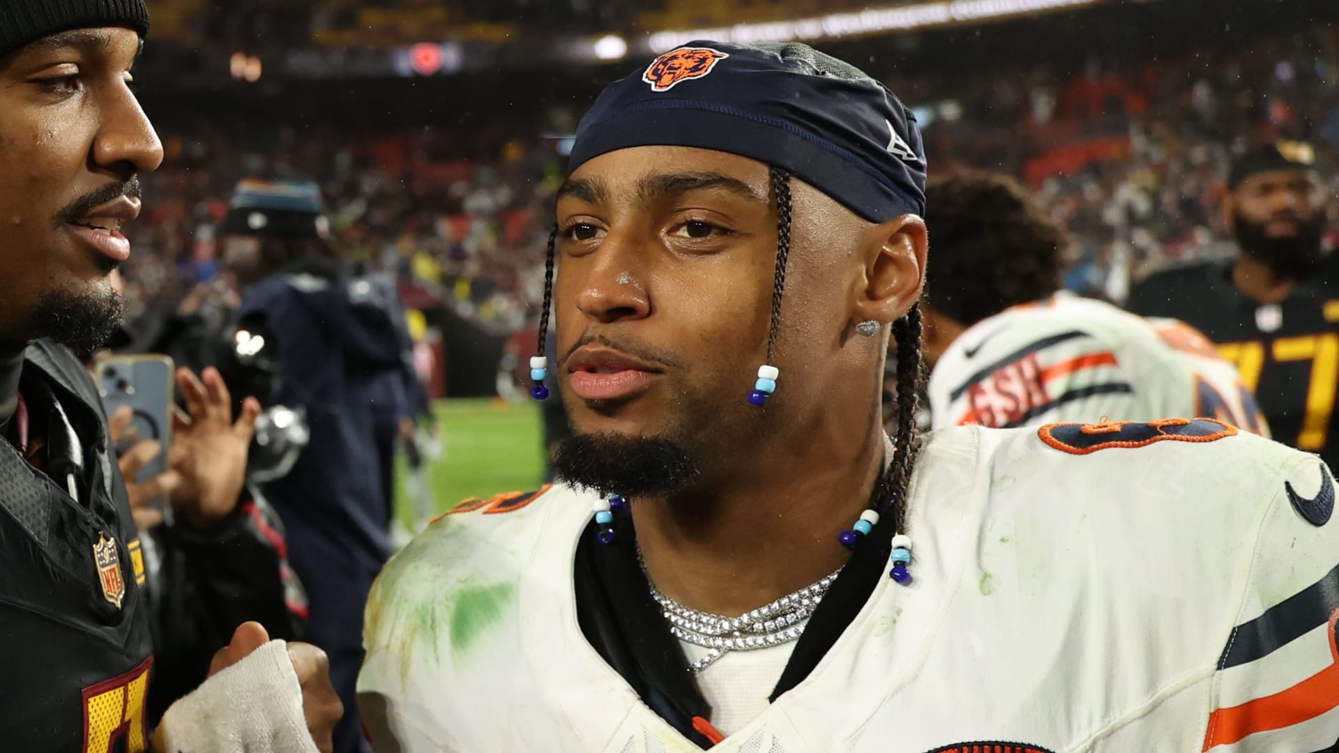 Oct 13, 2025; Landover, Maryland, USA; Washington Commanders quarterback Jayden Daniels (5) greets Chicago Bears cornerback Kyler Gordon (6) after the game at Northwest Stadium. Mandatory Credit: Geoff Burke-Imagn Images