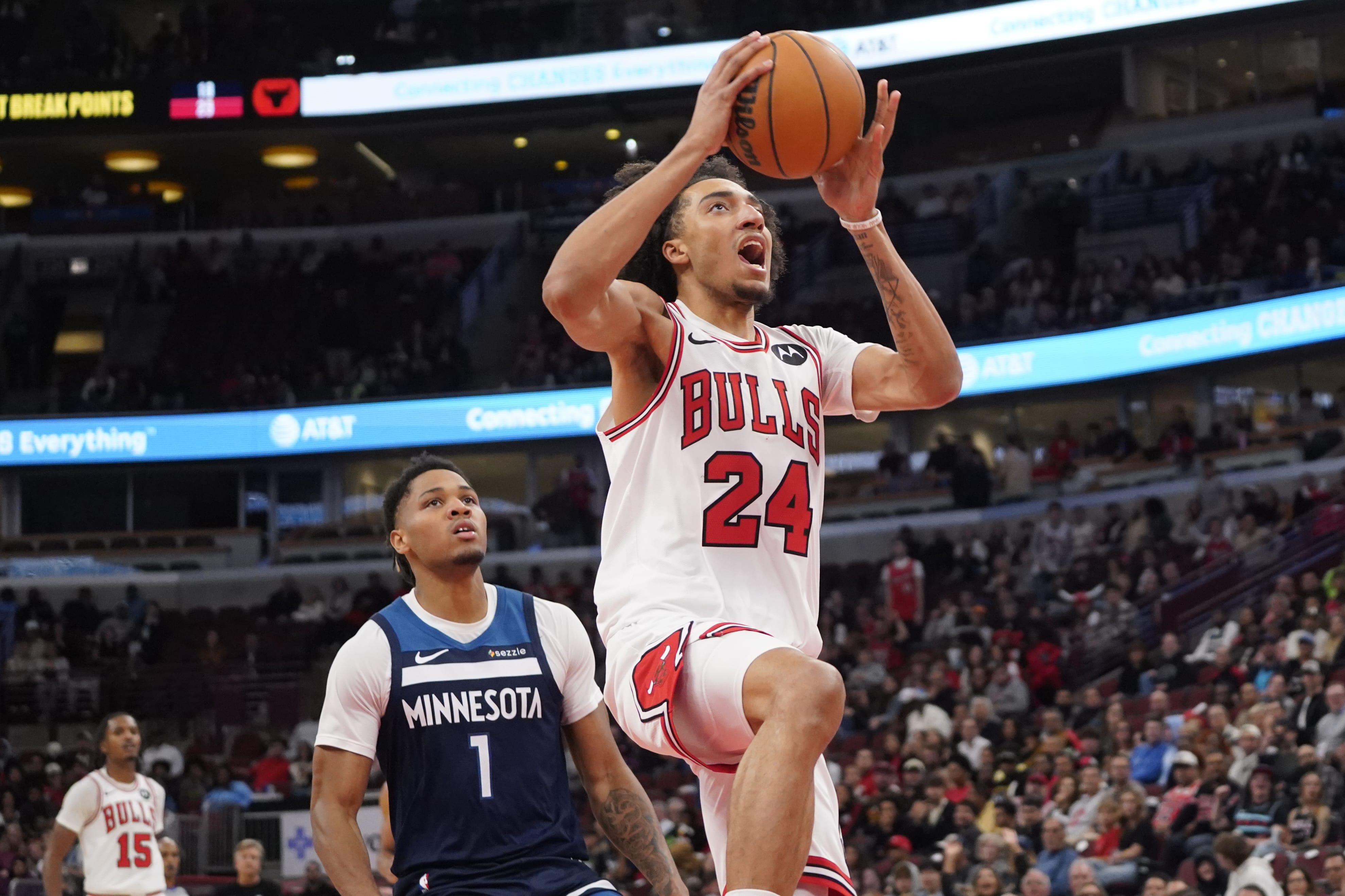 Oct 16, 2025; Chicago, Illinois, USA; Minnesota Timberwolves guard/forward Terrence Shannon Jr. (1) defends Chicago Bulls forward Noa Essengue (24) during the second half at United Center.