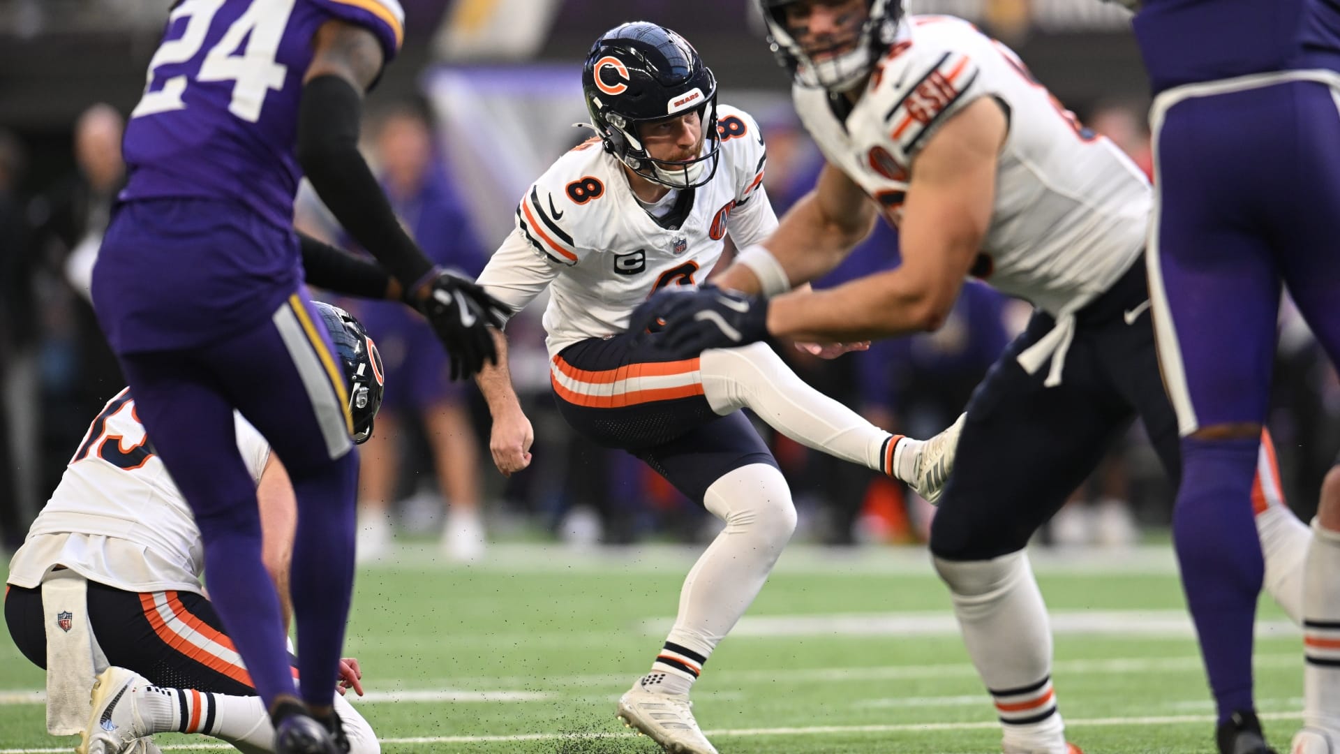 Chicago Bears kicker Cairo Santos (8) kicks a game-winning field goal during the fourth quarter against the Minnesota Vikings at U.S. Bank Stadium. Mandatory Credit: Jeffrey Becker-Imagn Images