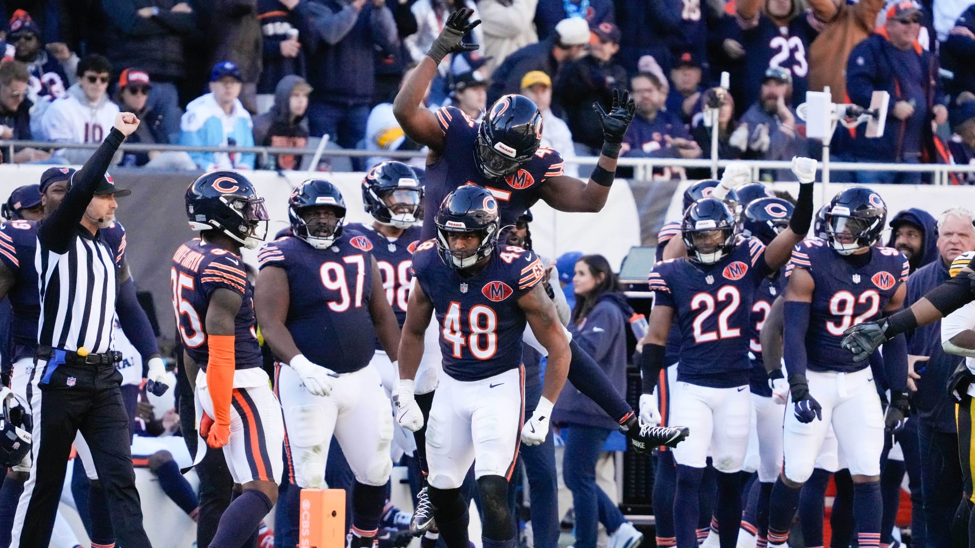 Chicago Bears linebacker Amen Ogbongbemiga (45) and linebacker D'Marco Jackson (48) react after a defensive stop during the second half at Soldier Field.