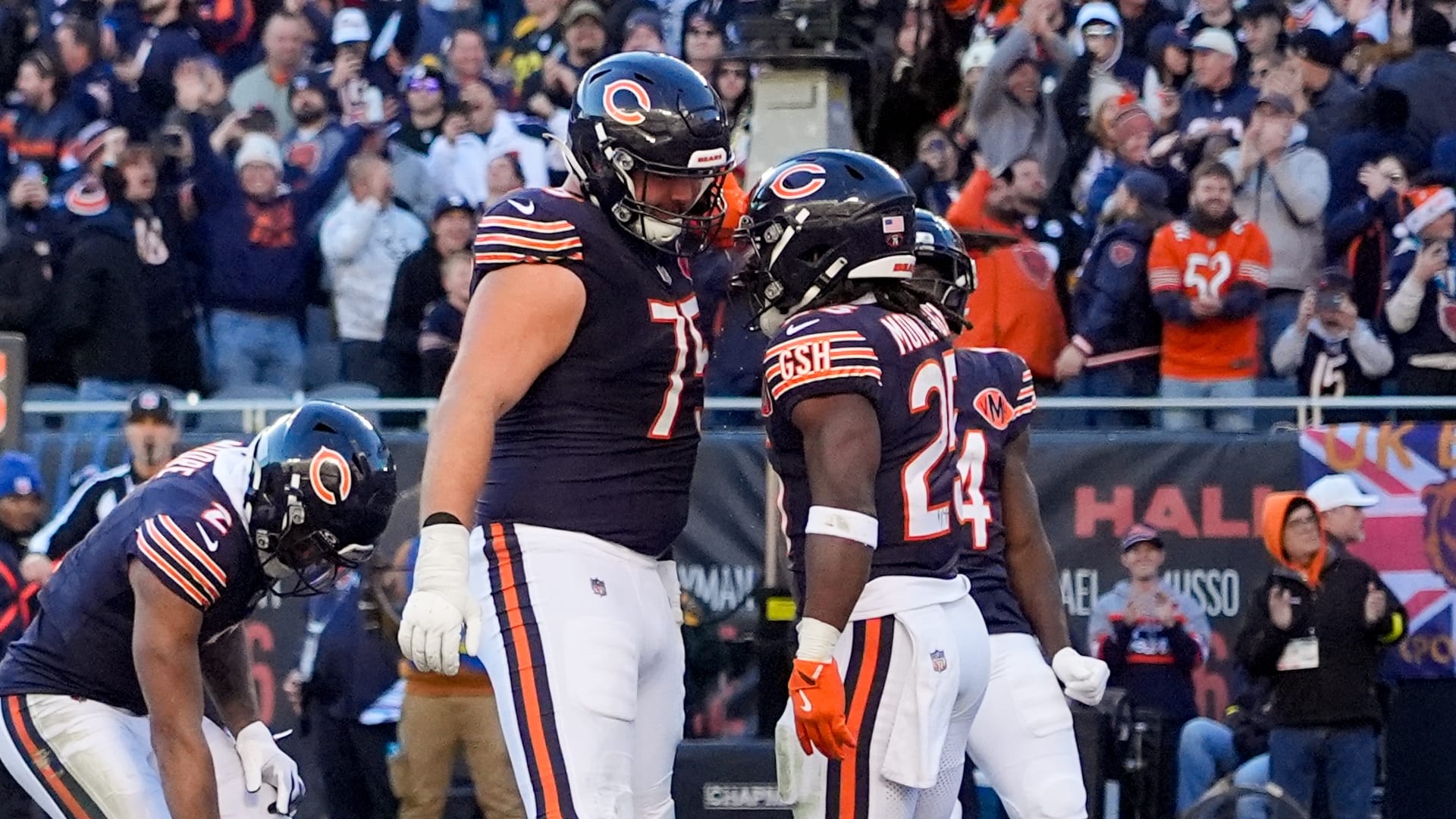 Nov 23, 2025; Chicago, Illinois, USA; Chicago Bears running back Kyle Monangai (25) reacts with offensive tackle Ozzy Trapilo (75) after scoring a touchdown against the Pittsburgh Steelers during the second half at Soldier Field.