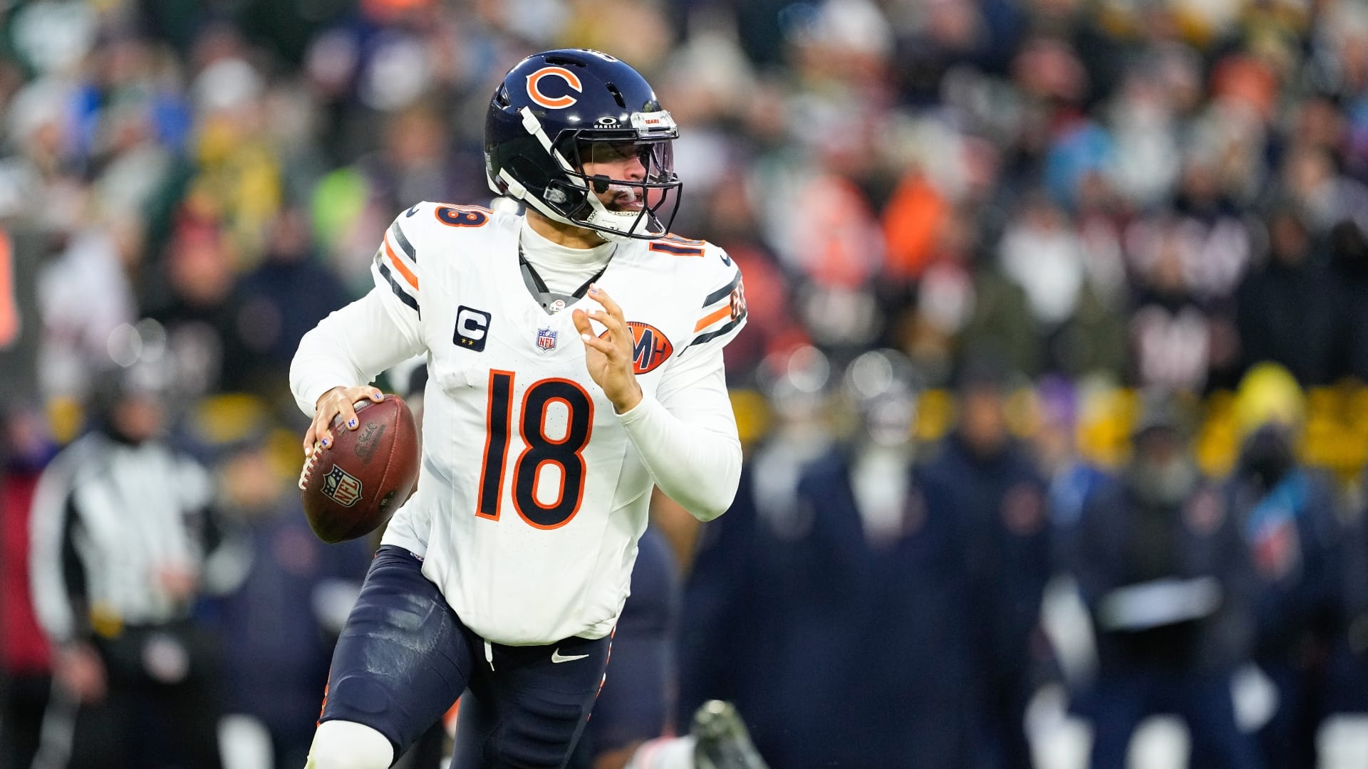 Dec 7, 2025; Green Bay, Wisconsin, USA; Chicago Bears quarterback Caleb Williams (18) looks to throw in the first quarter against the Green Bay Packers at Lambeau Field.
