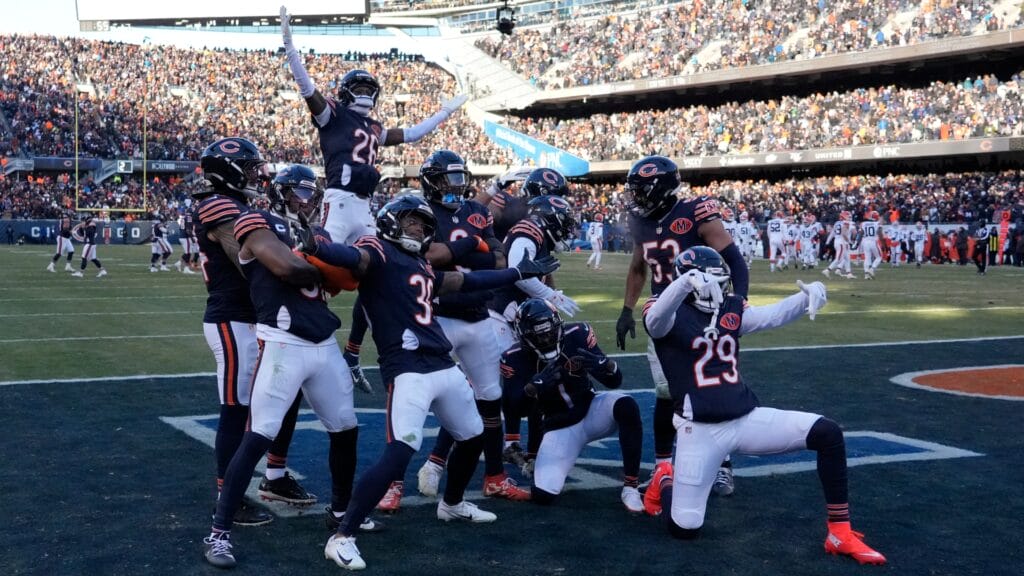 The Chicago Bears, including DB Jayllon Johnson, celebrate after an interception during the fourth quarter against the Cleveland Browns at Soldier Field. Mandatory Credit: David Banks-Imagn Images
