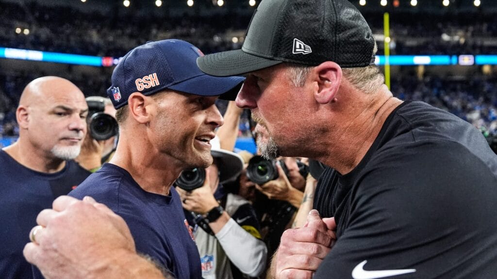 Detroit Lions head coach Dan Campbell, right, shakes hands with Chicago Bears head coach Ben Johnson after 52-21 win over the Bears at Ford Field in Detroit on Sunday, Sept. 14, 2025.
