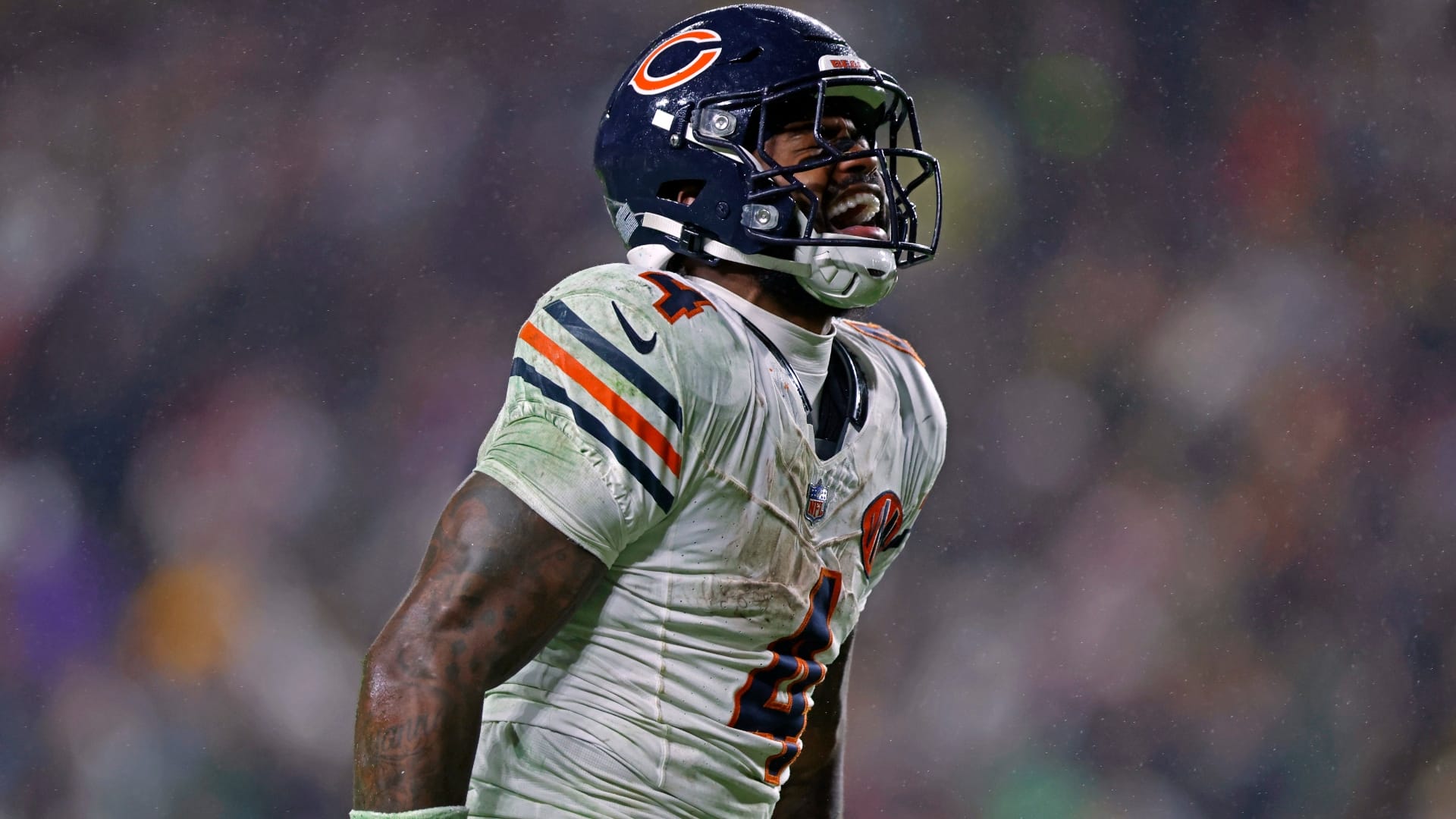 Chicago Bears running back D'Andre Swift (4) reacts to a first down during the fourth quarter against the Washington Commanders at Northwest Stadium. Mandatory Credit: Peter Casey-Imagn Images