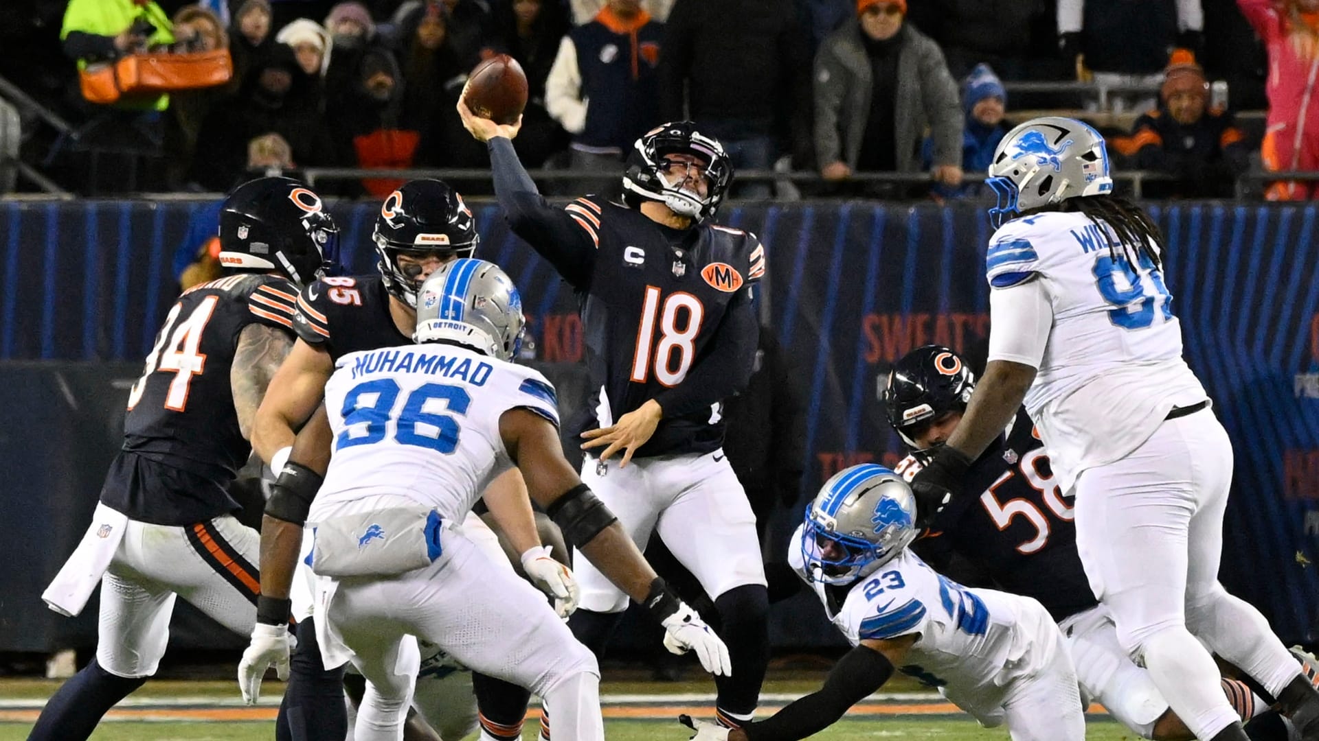 Jan 4, 2026; Chicago, Illinois, USA; Chicago Bears quarterback Caleb Williams (18) passes the ball against the Detroit Lions during the second half at Soldier Field.