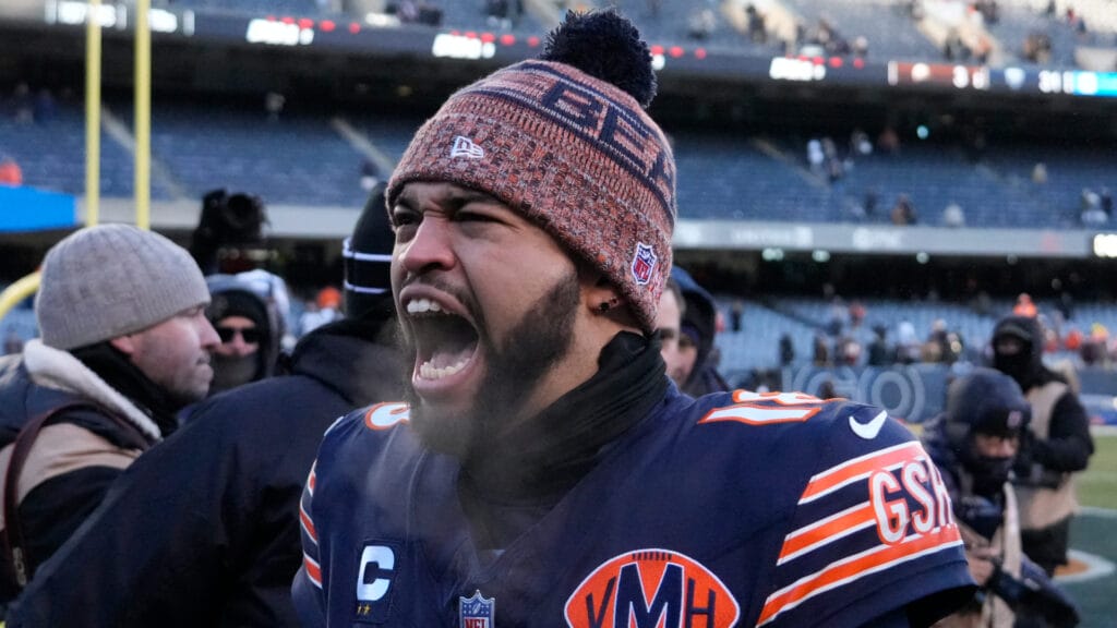 Dec 14, 2025; Chicago, Illinois, USA; Chicago Bears quarterback Caleb Williams (18) celebrates after defeating the Cleveland Browns at Soldier Field. Mandatory Credit: David Banks-Imagn Images