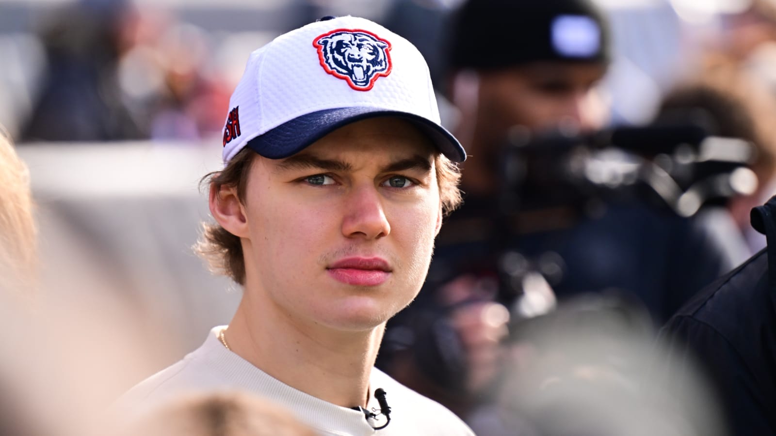 Nov 24, 2024; Chicago, Illinois, USA; Chicago Blackhawks player Connor Bedard stands on the sideline before the game between the Chicago Bears and Minnesota Vikings at Soldier Field. Mandatory Credit: Daniel Bartel-Imagn Images