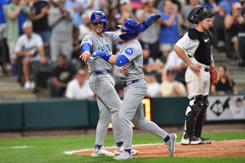 Jul 26, 2025; Chicago, Illinois, USA; Chicago Cubs third baseman Matt Shaw (6) celebrates his two-run home run with second baseman Nico Hoerner (2) during the seventh inning against the Chicago White Sox at Rate Field.