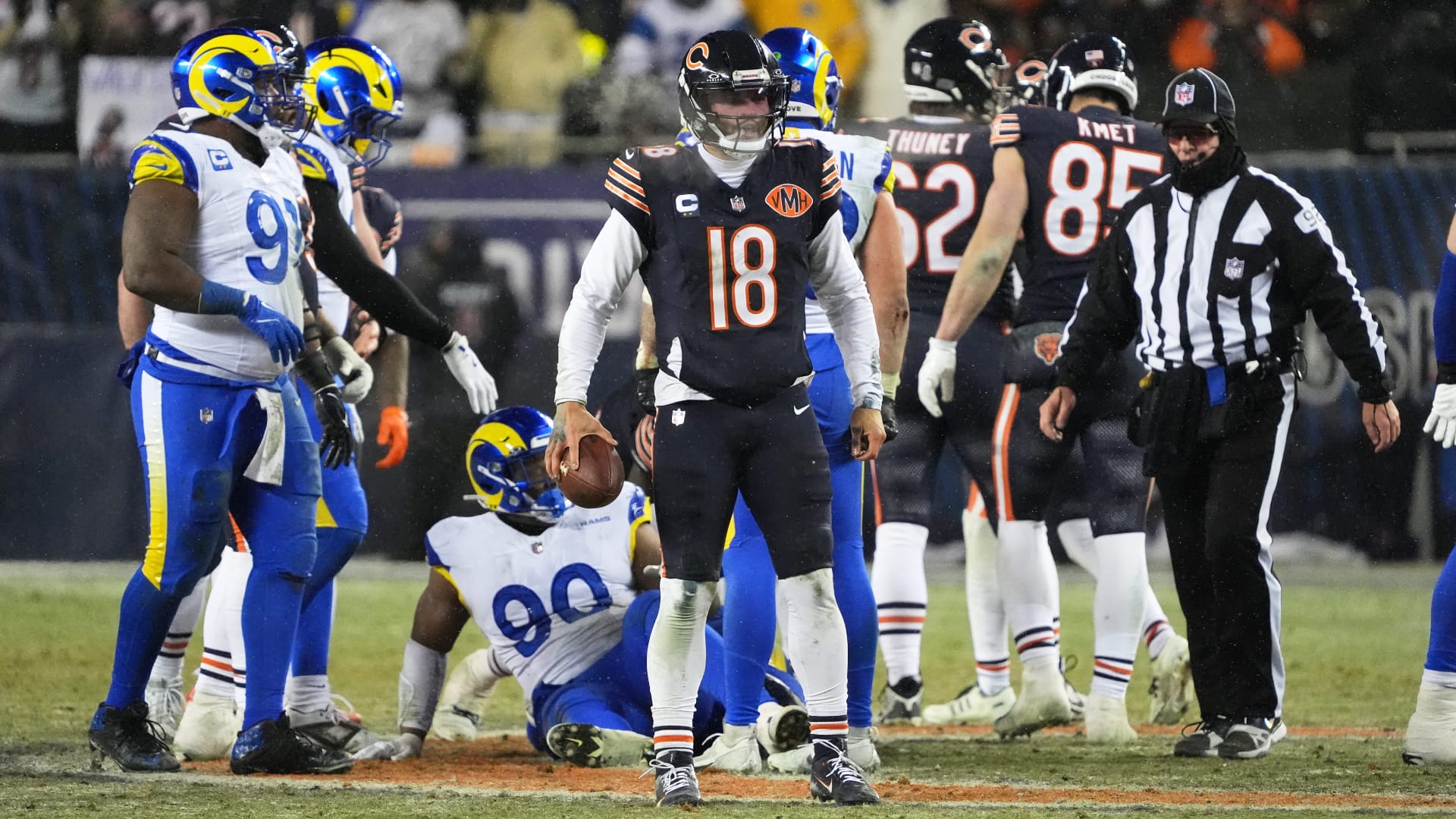 Chicago Bears quarterback Caleb Williams (18) looks on against the Los Angeles Rams during overtime of an NFC Divisional Round game at Soldier Field. Mandatory Credit: David Banks-Imagn Images
