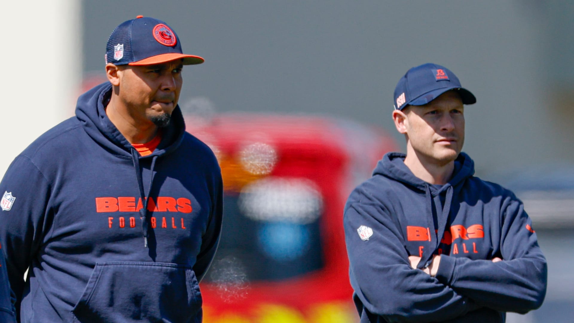 Chicago Bears general manager Ryan Poles (L) and head coach Ben Johnson (R) observe during the Rookie Minicamp at Halas Hall. Mandatory Credit: Kamil Krzaczynski-Imagn Images