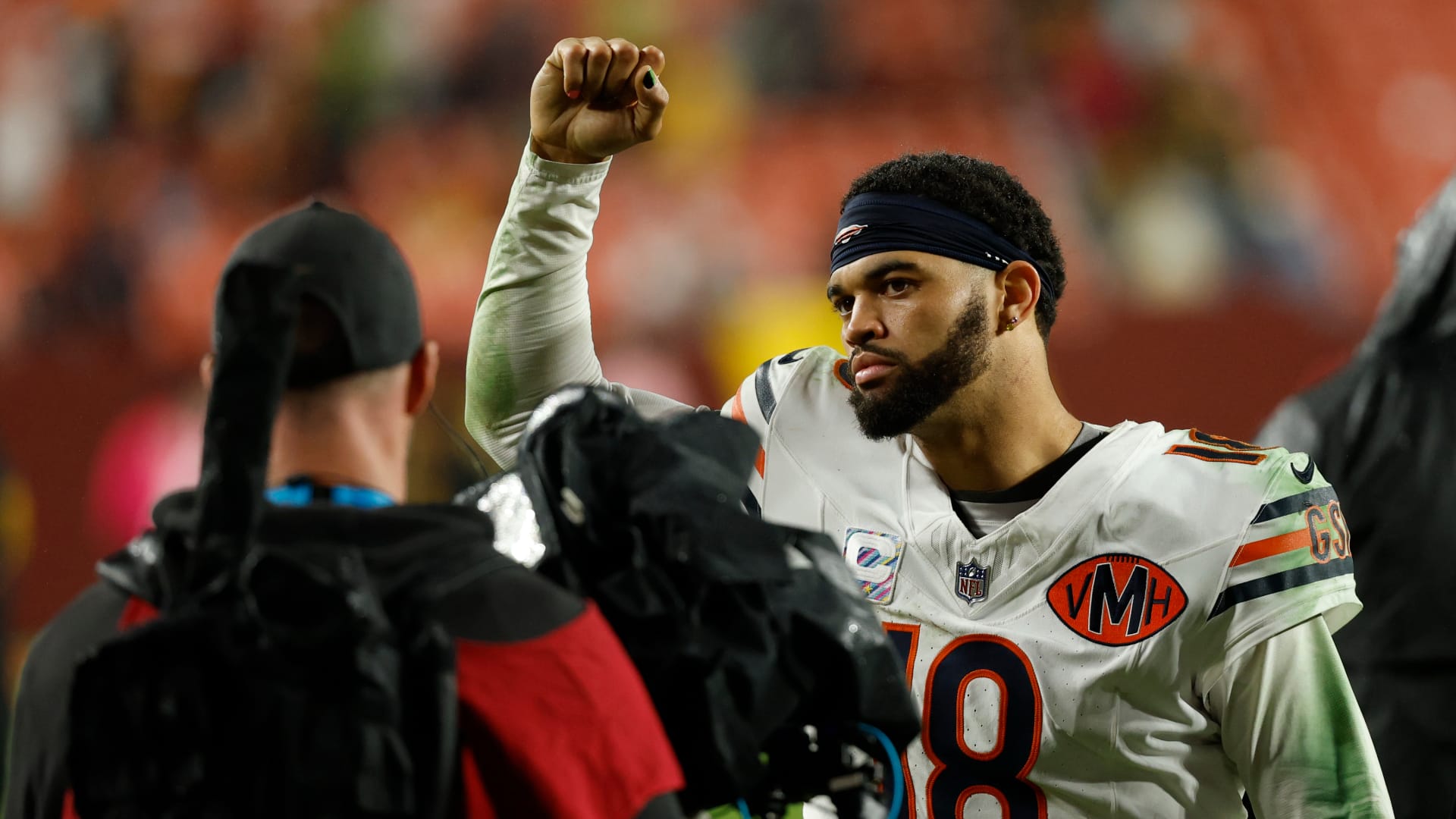 Oct 13, 2025; Landover, Maryland, USA; Chicago Bears quarterback Caleb Williams (18) celebrates while leaving the field after the game against the Washington Commanders at Northwest Stadium. Mandatory Credit: Geoff Burke-Imagn Images