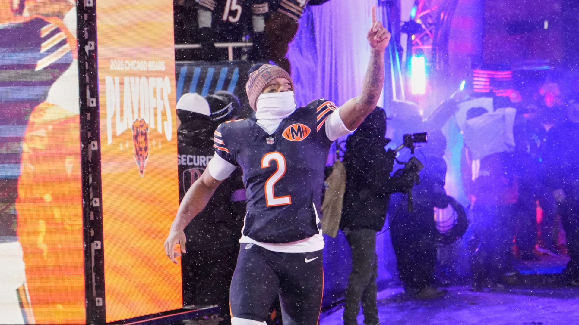 Chicago Bears wide receiver DJ Moore (2) runs onto the field during player introductions before a NFC Divisional Round game against the Los Angeles Rams at Soldier Field. Mandatory Credit: David Banks-Imagn Images