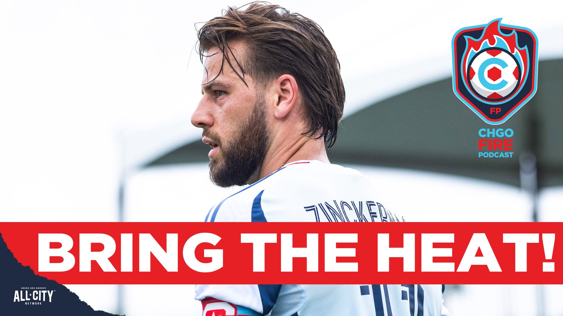 Chicago winger Philip Zinckernagel looks to the left while wearing the Fire's gray secondary kit. The CHGO Fire podcast logo is in the top right corner, and a red banner with white text across the bottom of the screen reads "BRING THE HEAT!"
