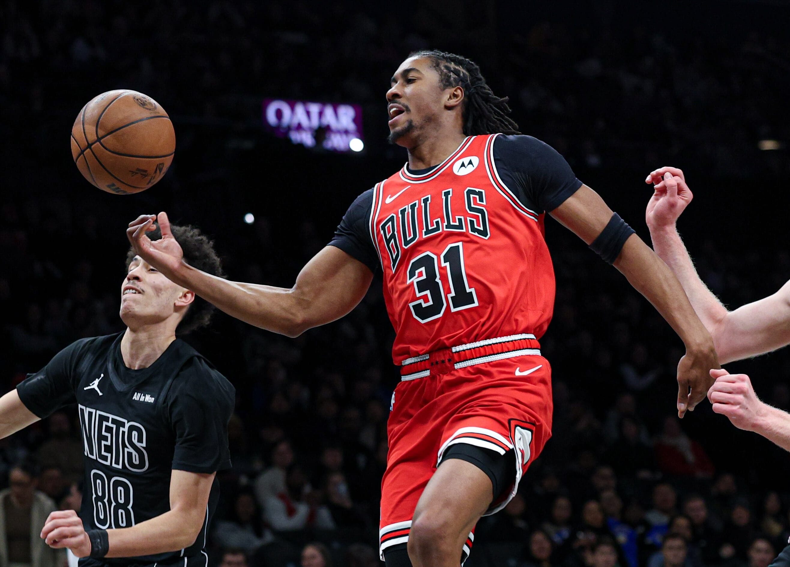 Feb 9, 2026; Brooklyn, New York, USA; Chicago Bulls guard Jaden Ivey (31) is fouled by Brooklyn Nets guard Nolan Traore (88) during the first quarter at Barclays Center