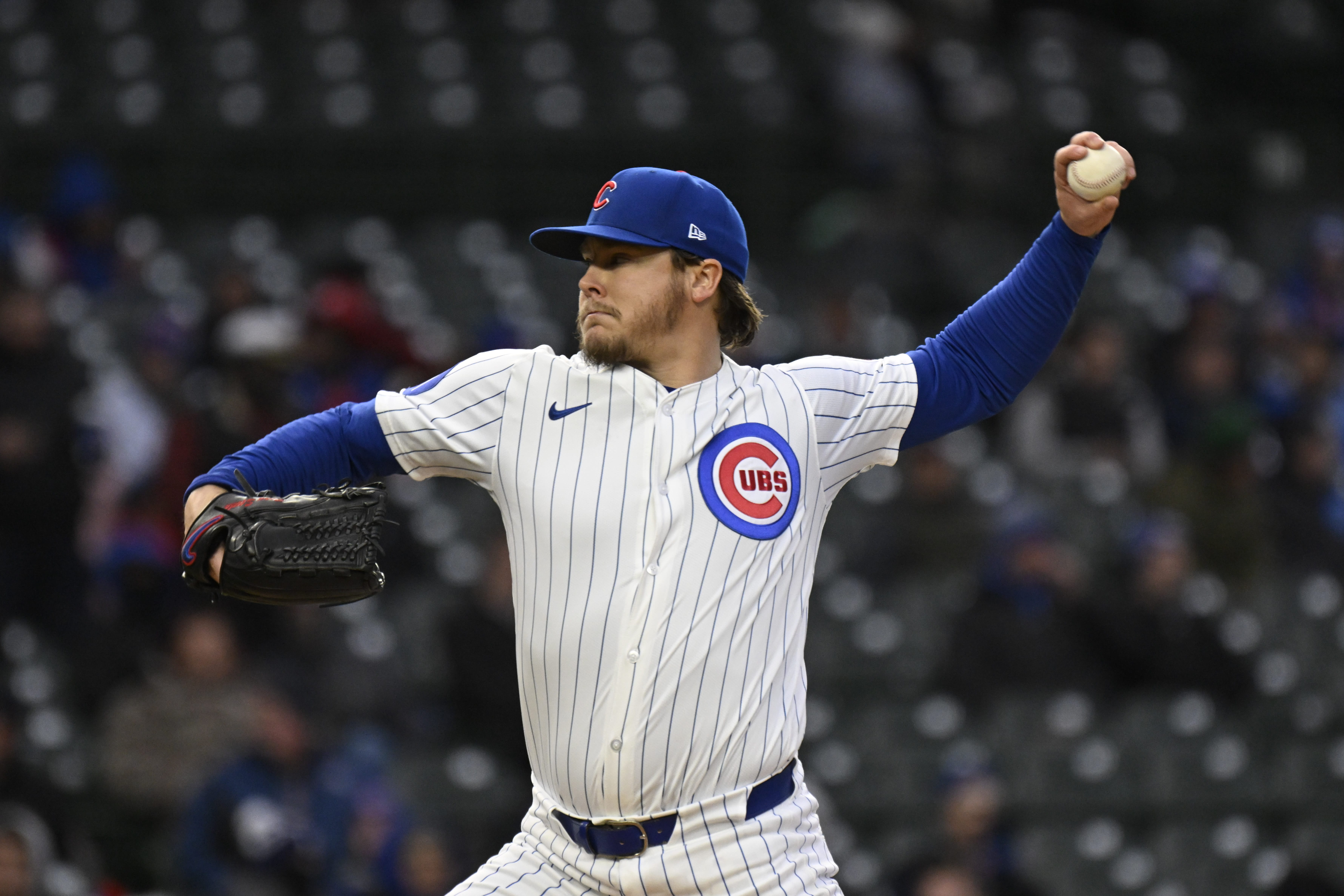 Apr 7, 2025; Chicago, Illinois, USA; Chicago Cubs pitcher Justin Steele (35) delivers against the Texas Rangers during the first inning at Wrigley Field.