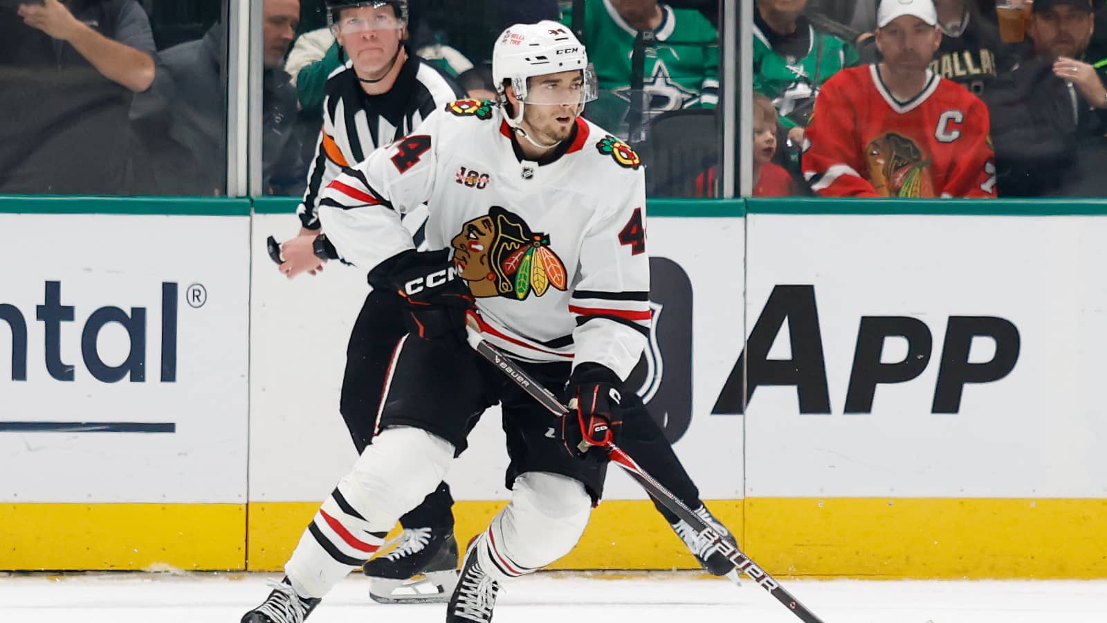 Dec 27, 2025; Dallas, Texas, USA; Chicago Blackhawks defenseman Wyatt Kaiser (44) skates with the puck against the Dallas Stars during the first period at American Airlines Center. Mandatory Credit: Chris Jones-Imagn Images