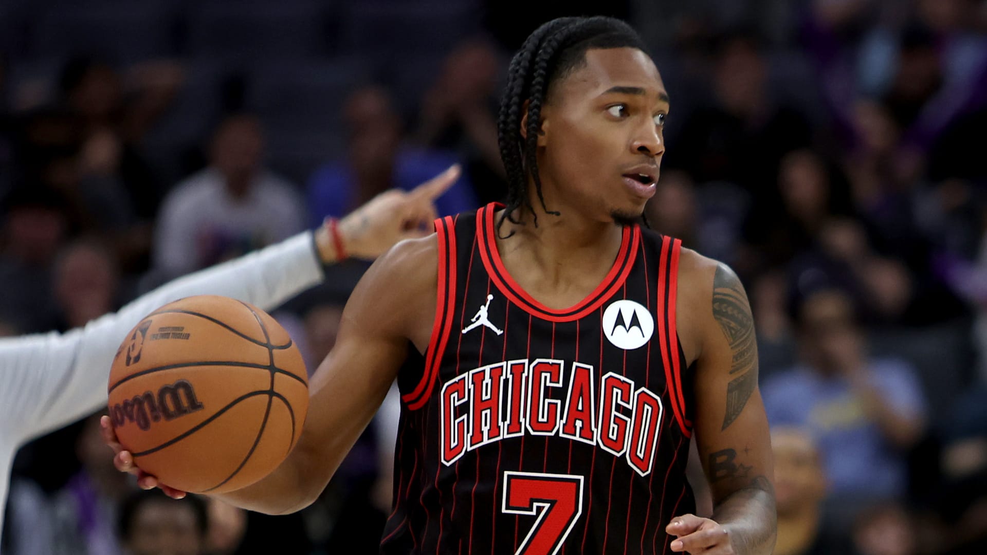 Chicago Bulls guard Rob Dillingham (7) dribbles the ball up court against the Sacramento Kings during the third quarter at Golden 1 Center. Mandatory Credit: Dennis Lee-Imagn Images