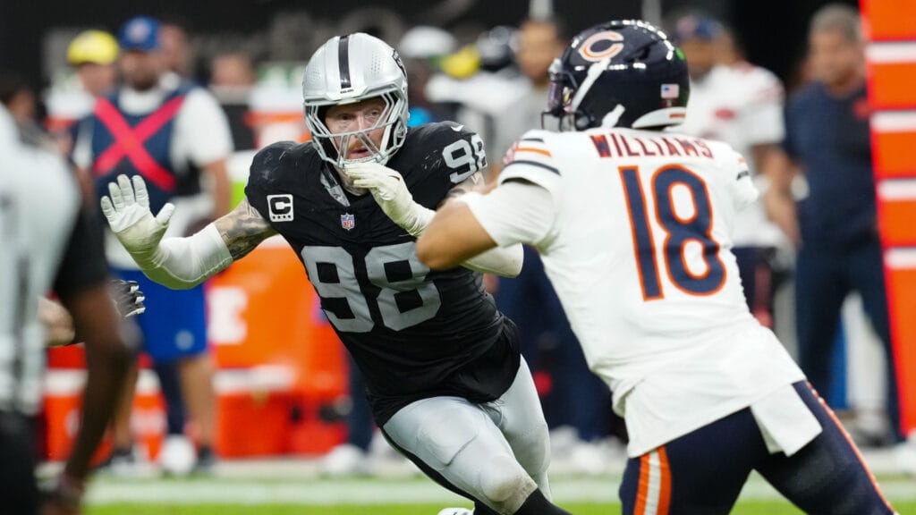 Sep 28, 2025; Paradise, Nevada, USA; Las Vegas Raiders defensive end Maxx Crosby (98) pressures Chicago Bears quarterback Caleb Williams (18) during the second half at Allegiant Stadium. Mandatory Credit: Stephen R. Sylvanie-Imagn Images