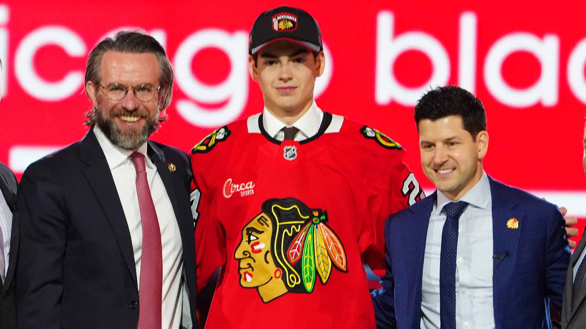 Jun 28, 2024; Las Vegas, Nevada, USA; Sacha Boisvert is selected by the Chicago Blackhawks with the 18th overall pick in the first round of the 2024 NHL Draft at The Sphere.