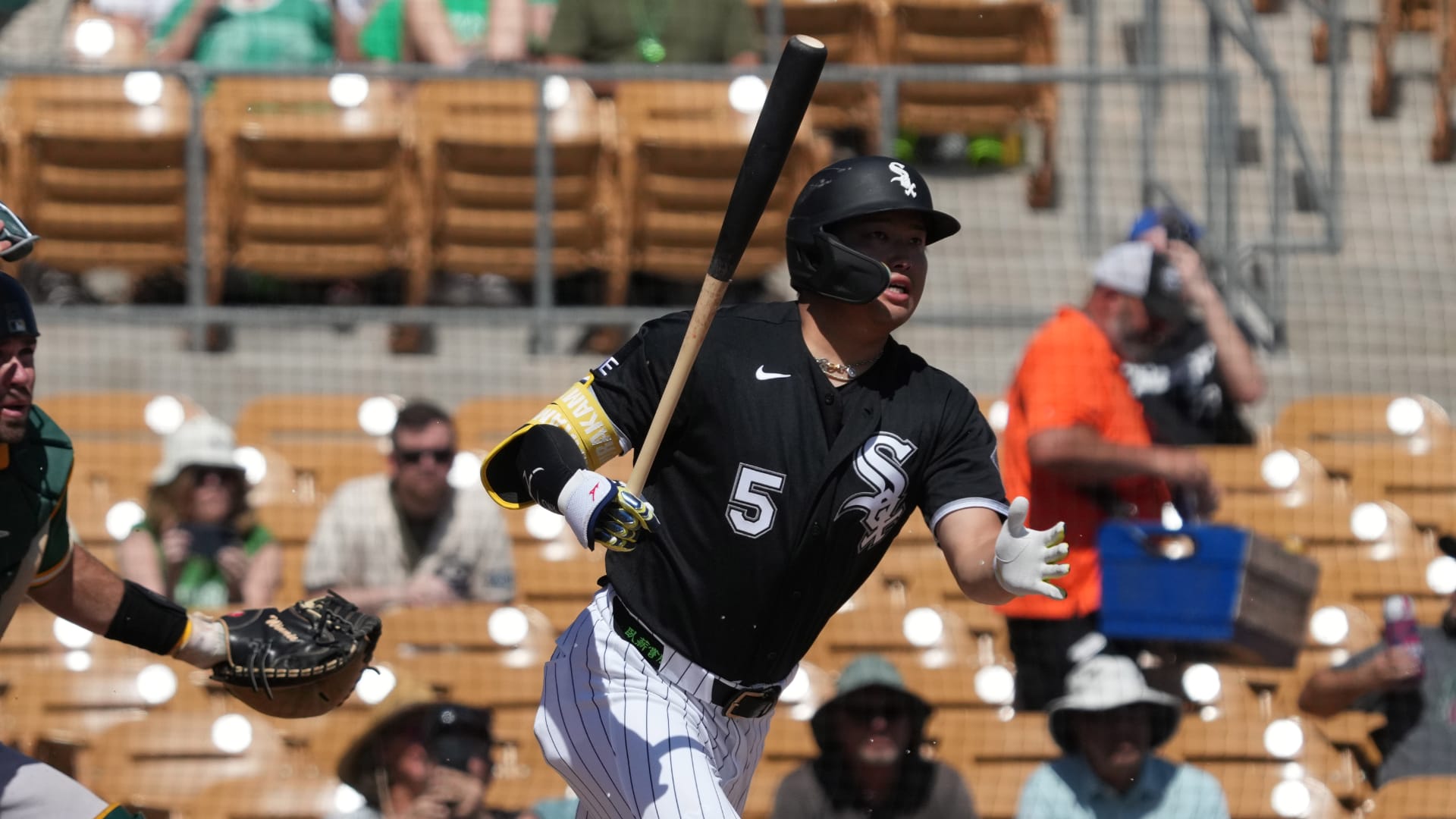 Chicago White Sox third baseman Munetaka Murakami (5) hits against the Athletics in the first inning at Camelback Ranch-Glendale. Mandatory Credit: Rick Scuteri-Imagn Images