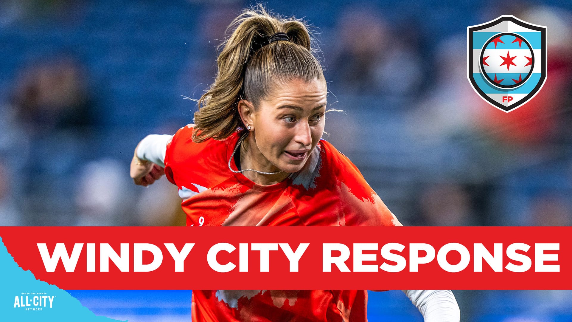 Jordyn Huitema looks to the right while in mid air having just headed a soccer ball wearing a red warmup kit. A red banner with white text across the bottom of the screen reads 'WINDY CITY RESPONSE'