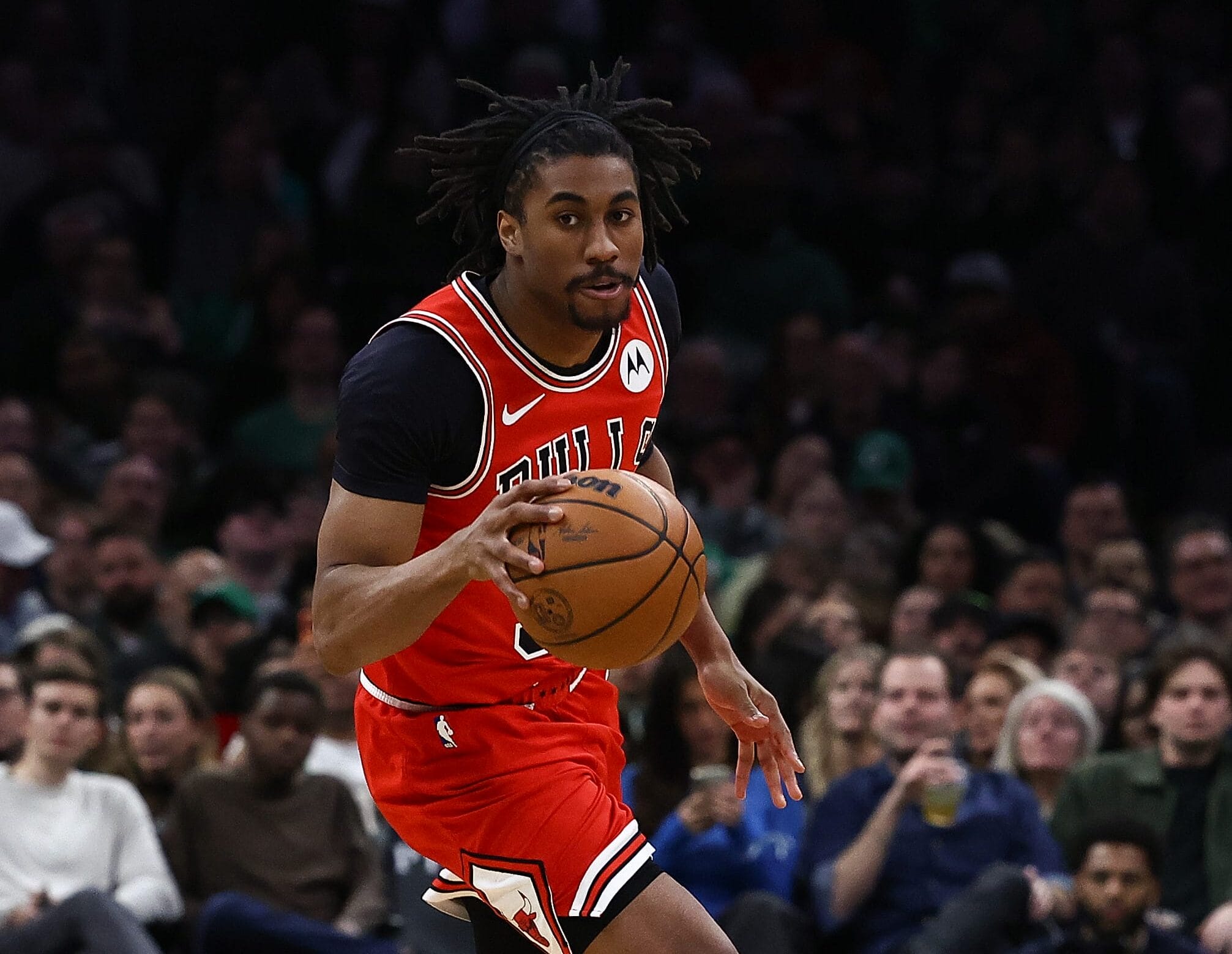 Feb 11, 2026; Boston, Massachusetts, USA; Chicago Bulls guard Jaden Ivey (31) brings the ball up the court against the Boston Celtics during the second half at TD Garden.