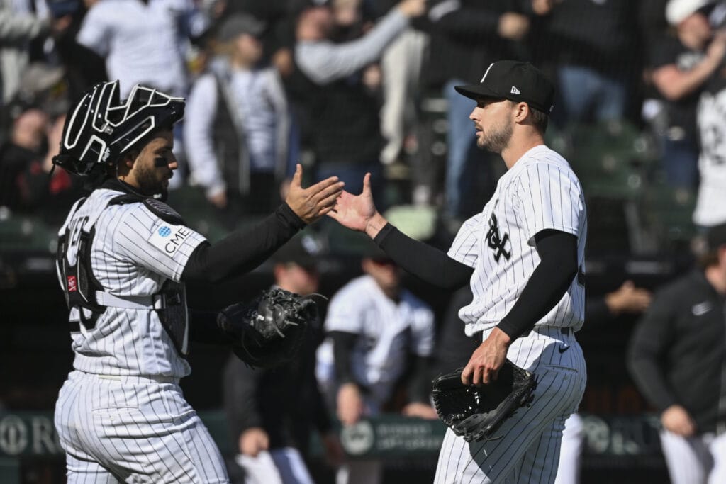 Apr 5, 2026; Chicago, Illinois, USA; Chicago White Sox catcher Edgar Quero (26) and pitcher Chris Murphy (38) high five after the game against Toronto Blue Jays at Rate Field.