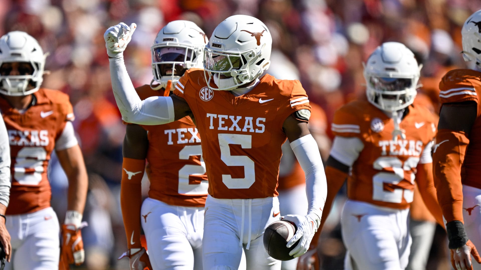 Bears draft pick and Texas Longhorns defensive back Malik Muhammad (5) celebrates after an interception during the game between the Texas Longhorns and the Oklahoma Sooners at the Cotton Bowl. Mandatory Credit: Jerome Miron-Imagn Images