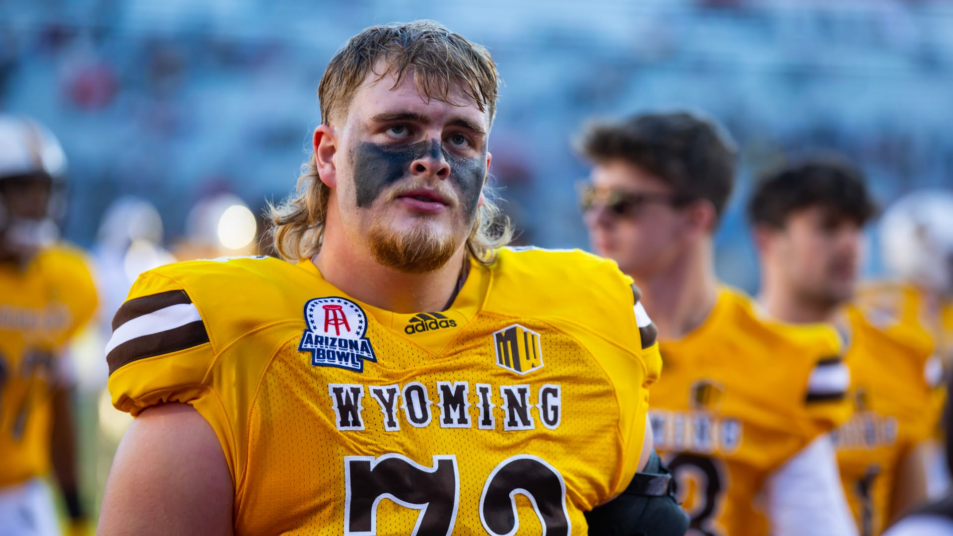 Chicago Bears UDFA and former Wyoming Cowboys OT Caden Barnett (72) against the Ohio Bobcats during the 2022 Barstool Sports Arizona Bowl. (Mark J. Rebilas-Imagn Images)