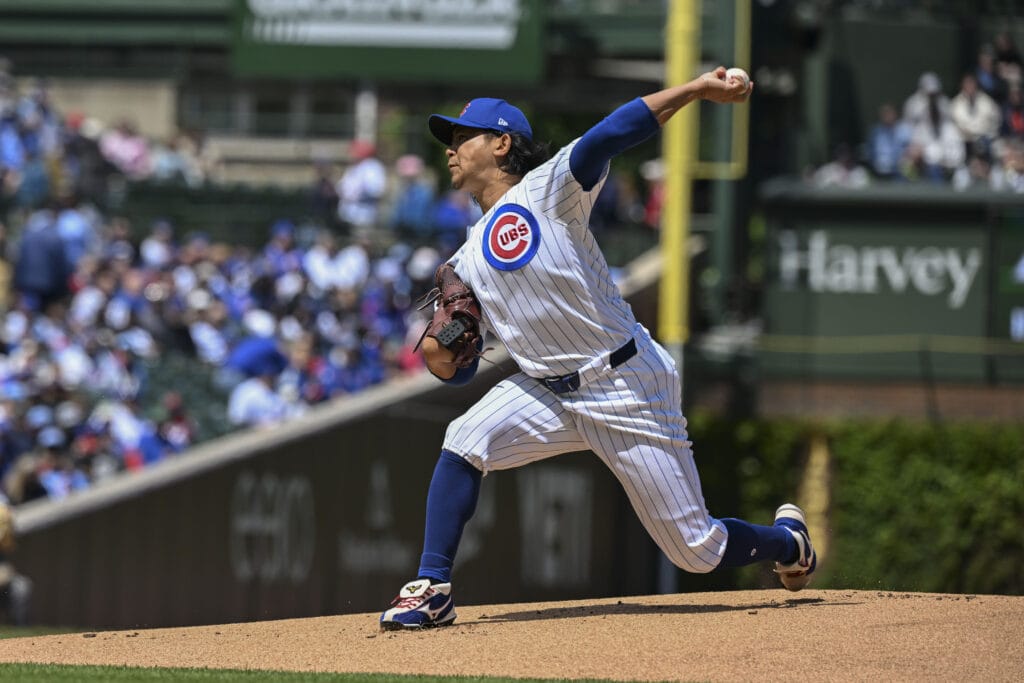 May 2, 2026; Chicago, Illinois, USA; Chicago Cubs pitcher Shota Imanaga (18) delivers during the first inning against the Arizona Diamondbacks at Wrigley Field.