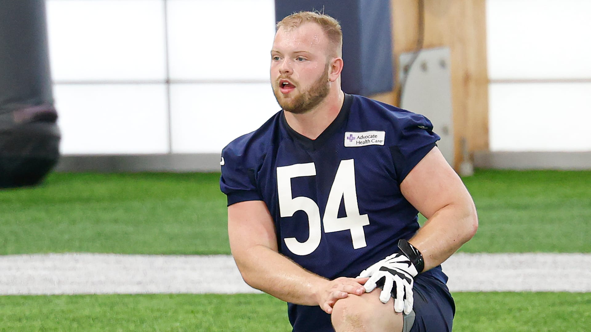 Chicago Bears offensive lineman Logan Jones (54) stretches during Rookie Minicamp at Halas Hall. Mandatory Credit: Kamil Krzaczynski-Imagn Images