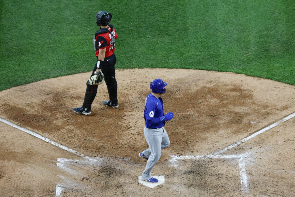 May 15, 2026; Chicago, Illinois, USA; Chicago Cubs first baseman Michael Busch (29) scores against the Chicago White Sox during the fifth inning at Rate Field.
