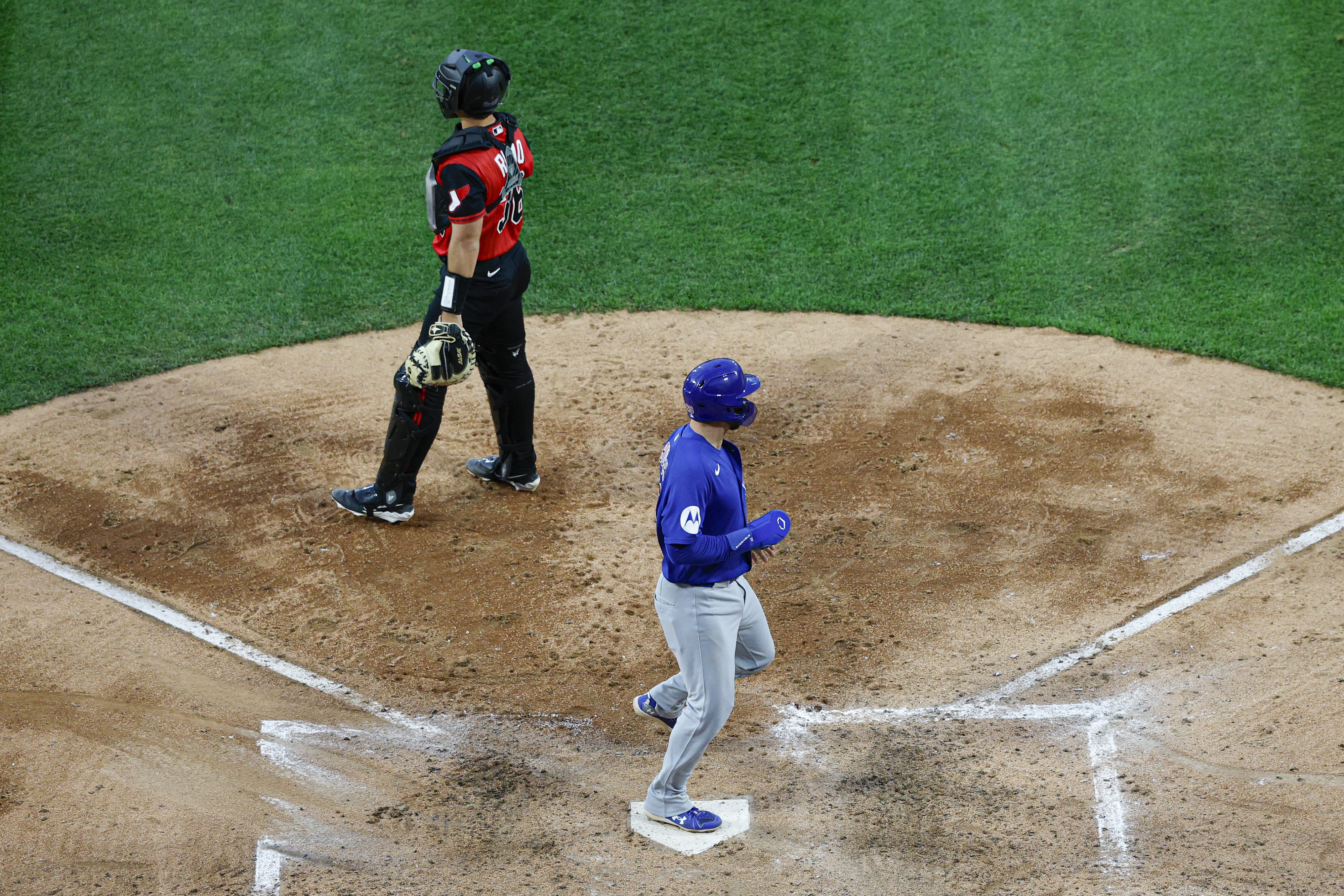 May 15, 2026; Chicago, Illinois, USA; Chicago Cubs first baseman Michael Busch (29) scores against the Chicago White Sox during the fifth inning at Rate Field.