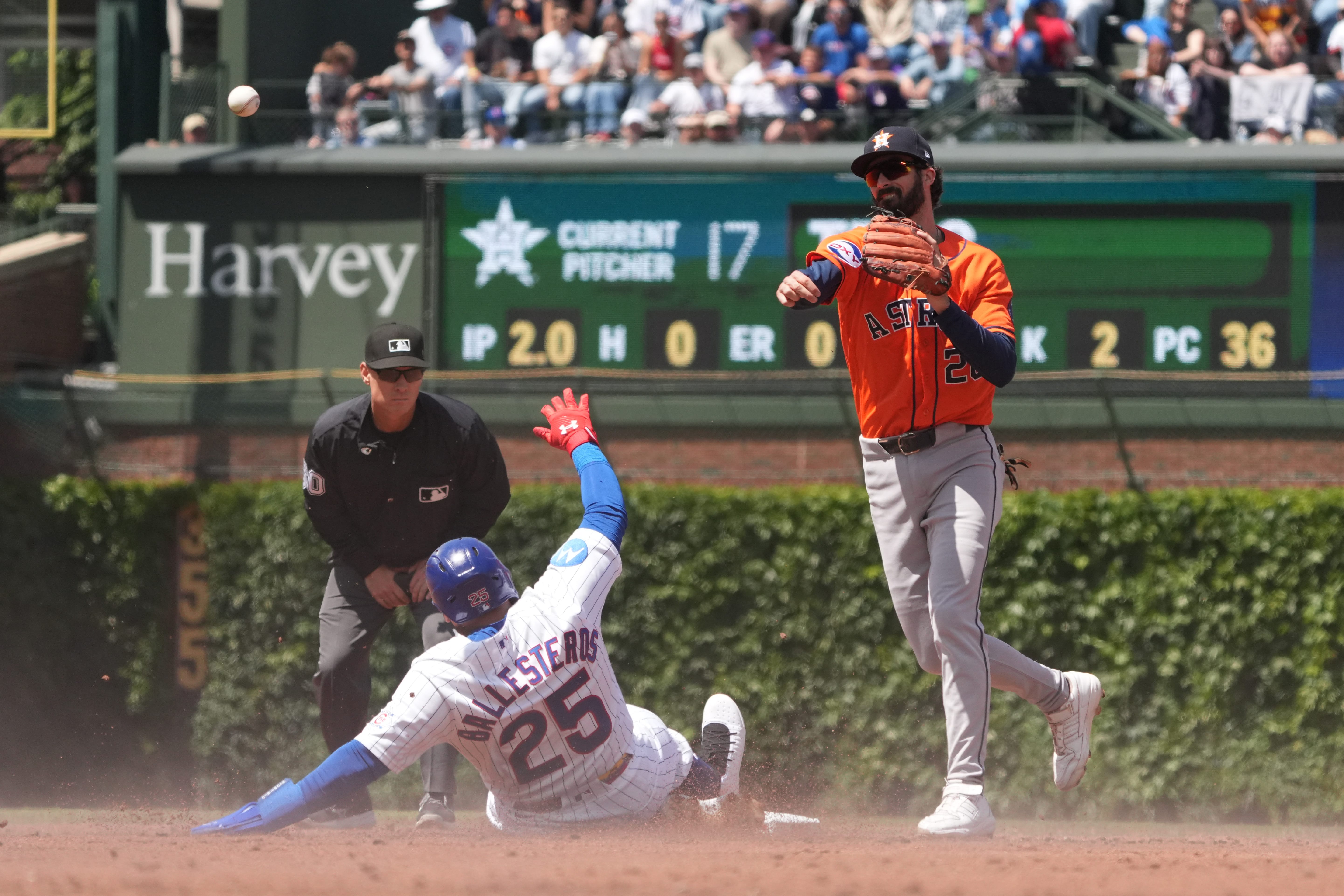 May 23, 2026; Chicago, Illinois, USA; Houston Astros second baseman Braden Shewmake (28) forces out Chicago Cubs designated hitter Moisés Ballesteros (25) at second base during the third inning at Wrigley Field.