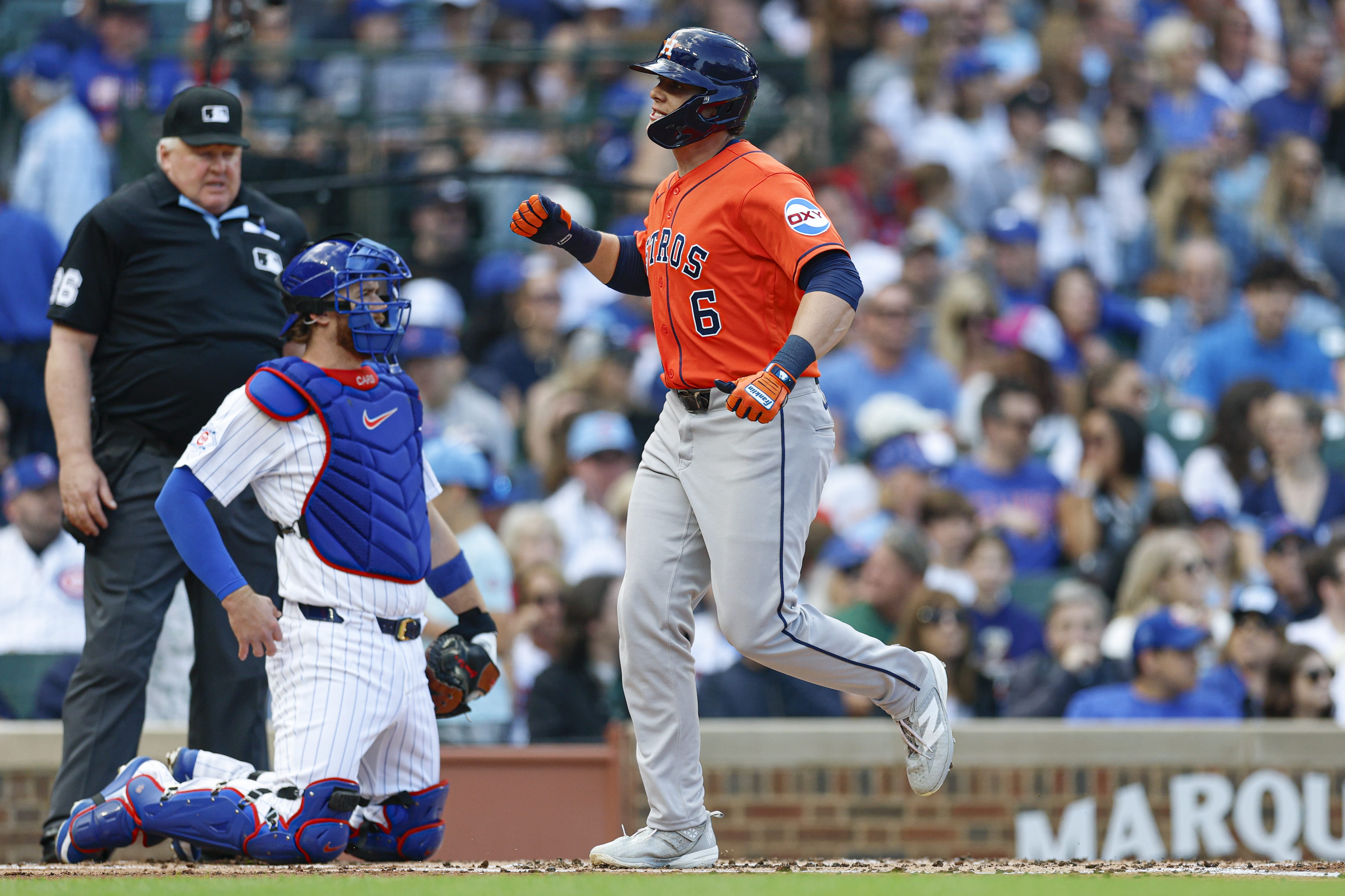 May 24, 2026; Chicago, Illinois, USA; Houston Astros center fielder Jake Meyers (6) crosses home plate after hitting a solo home run against the Chicago Cubs during the second inning at Wrigley Field.