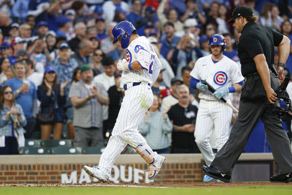 Jun 3, 2026; Chicago, Illinois, USA; Chicago Cubs right fielder Seiya Suzuki (27) crosses home plate after hitting a solo home run against the Athletics during the second inning at Wrigley Field.
