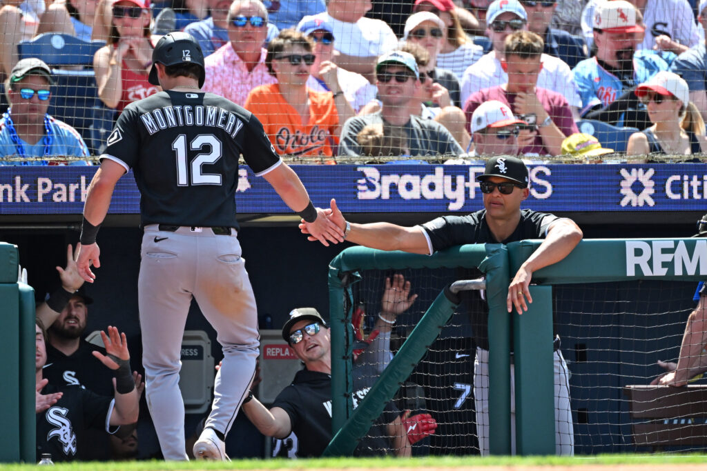 Jun 7, 2026; Philadelphia, Pennsylvania, USA; Chicago White Sox shortstop Colson Montgomery (12) celebrates with manager Will Venable (1) after scoring a run during the fifth inning against the Philadelphia Phillies at Citizens Bank Park.