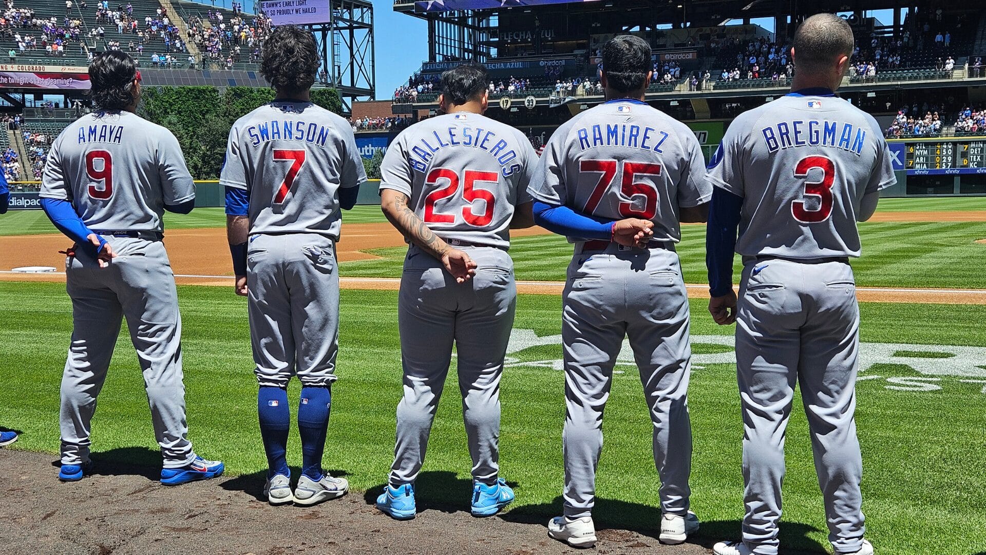 Cubs catcher Miguel Amaya (9), shortstop Dansby Swanson (7), designated hitter Moisés Ballesteros (25), second baseman Pedro Ramírez (75) and third baseman Alex Bregman (3) line up before the game Colorado Rockies at Coors Field. Mandatory Credit: Ron Chenoy-Imagn Images