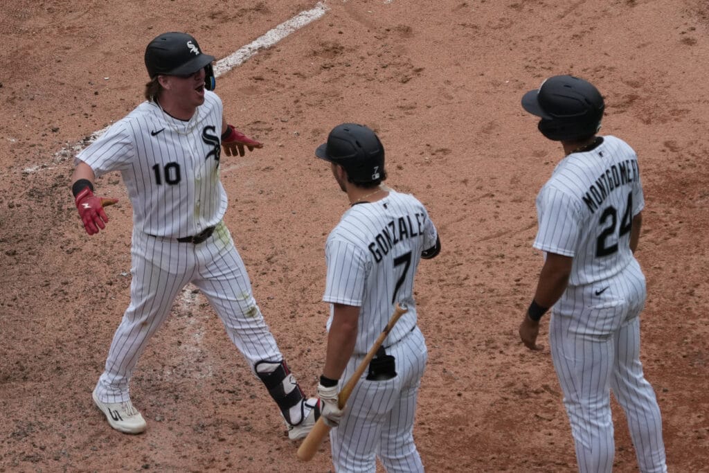 Jun 14, 2026; Chicago, Illinois, USA; Chicago White Sox second baseman Chase Meidroth (10) is greeted by outfielder Braden Montgomery (24) and first baseman Jacob Gonzalez (7) after hitting a two-run home run against the Los Angeles Dodgers during the sixth inning at Rate Field.