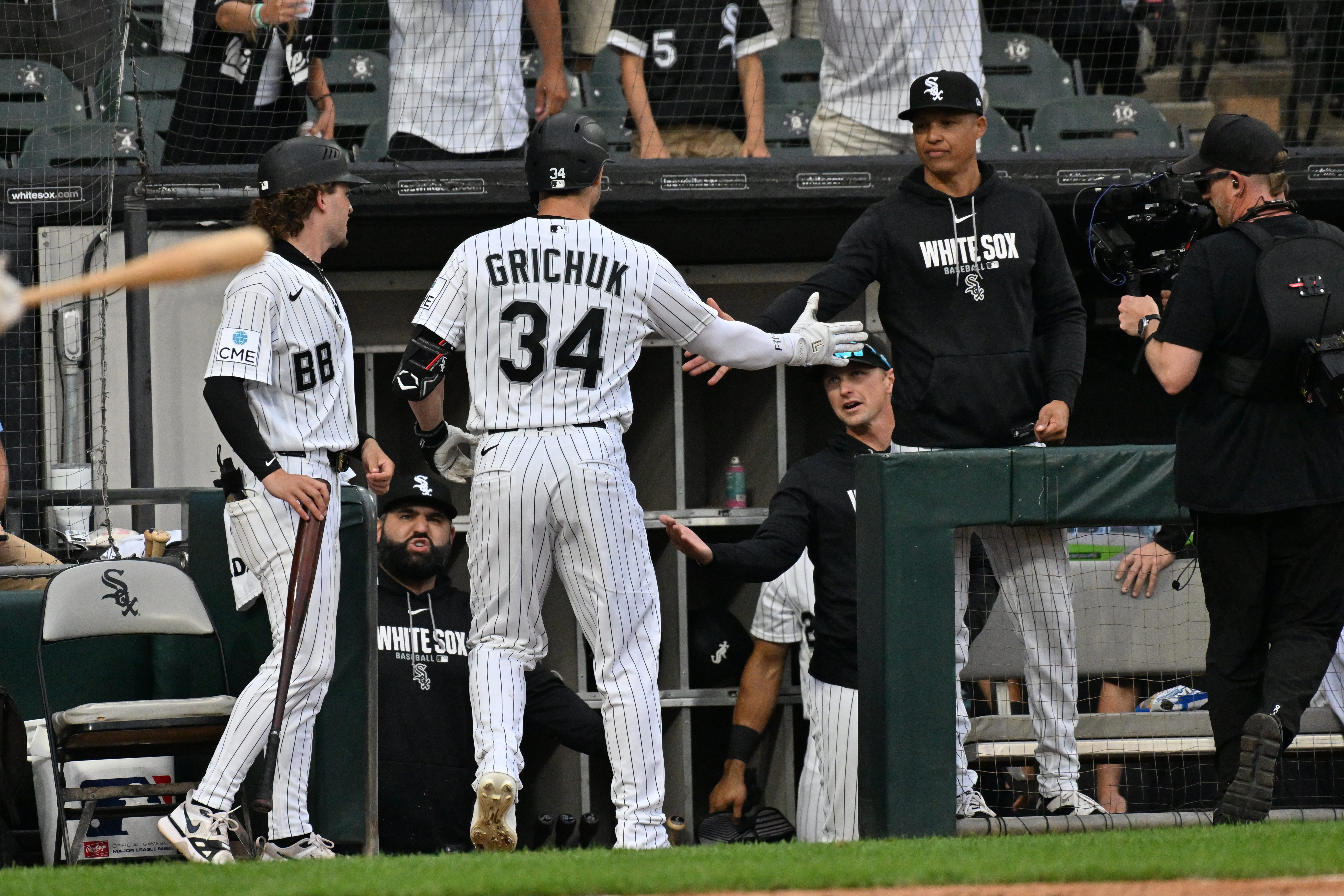 Jun 24, 2026; Chicago, Illinois, USA; Chicago White Sox outfielder Randal Grichuk (34) celebrates with manager Will Venable after hitting a home run against the Cleveland Guardians during the ninth inning at Rate Field.