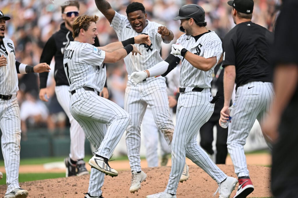 Jun 27, 2026; Chicago, Illinois, USA; Chicago White Sox left fielder Sam Antonacci (17) and designated hitter Luisangel Acuna (0) celebrate with first baseman Jacob Gonzalez (7) after defeating the Kansas City Royals via walk-off at Rate Field.