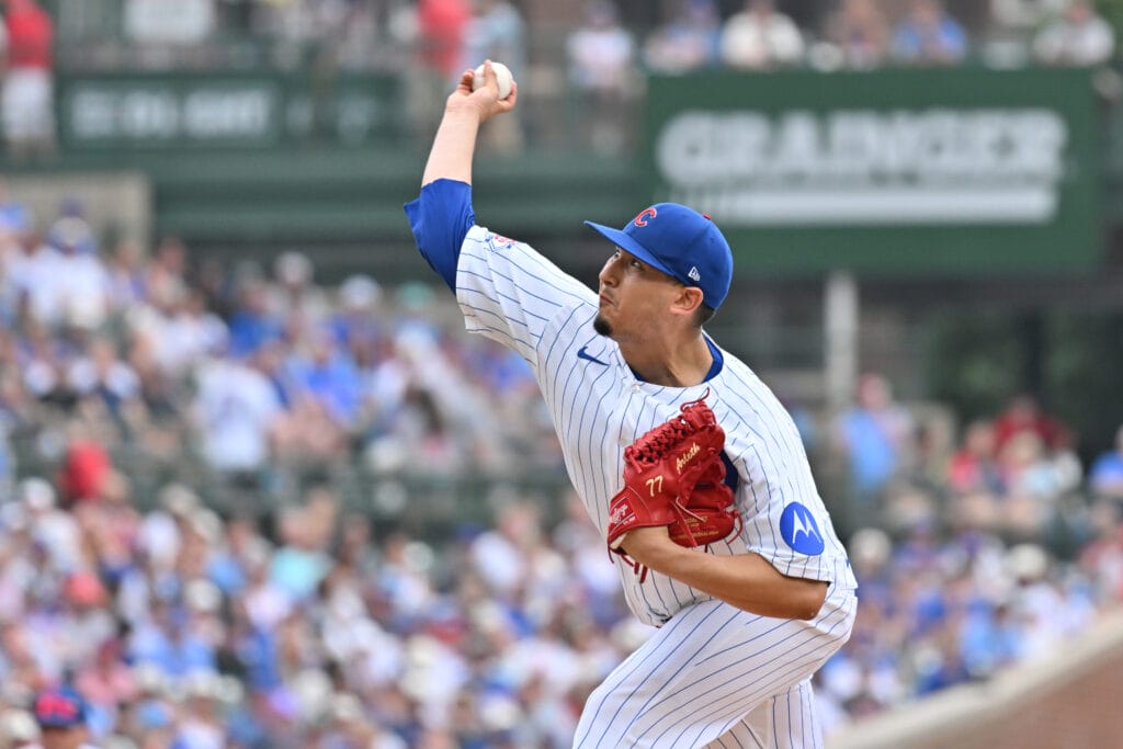 Jul 5, 2026; Chicago, Illinois, USA; Chicago Cubs pitcher Javier Assad (72) pitches against the St. Louis Cardinals during the first inning at Wrigley Field.