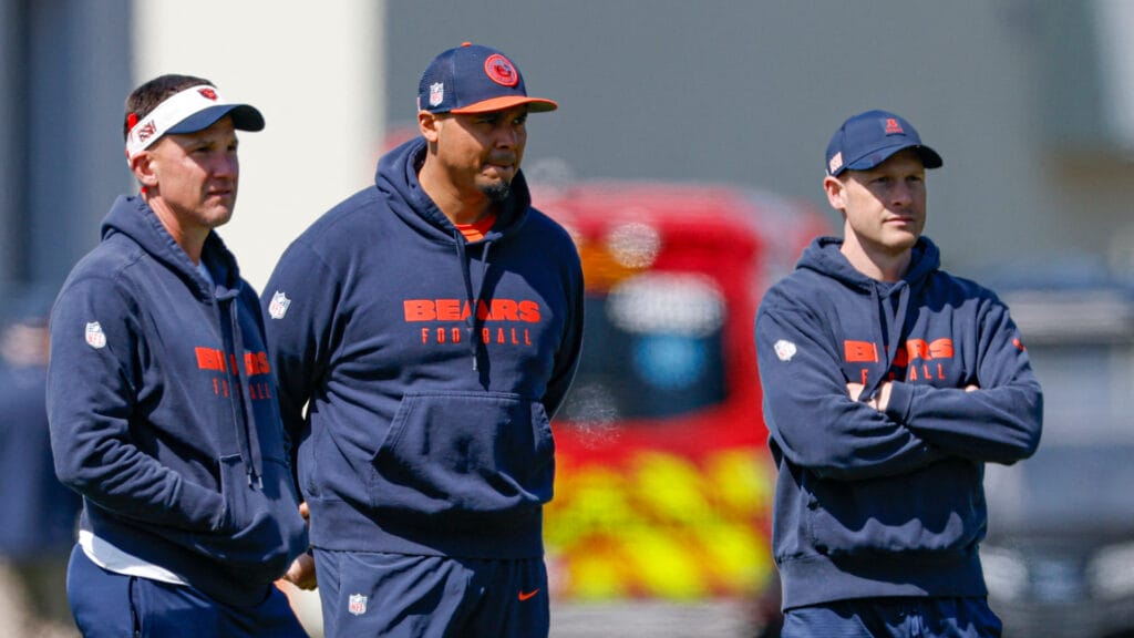 May 9, 2025; Lake Forest, IL, USA; Chicago Bears defensive coordinator Dennis Allen (L), general manager Ryan Poles (C) and head coach Ben Johnson (R) observe during the Rookie Minicamp at Halas Hall. Mandatory Credit: Kamil Krzaczynski-Imagn Images