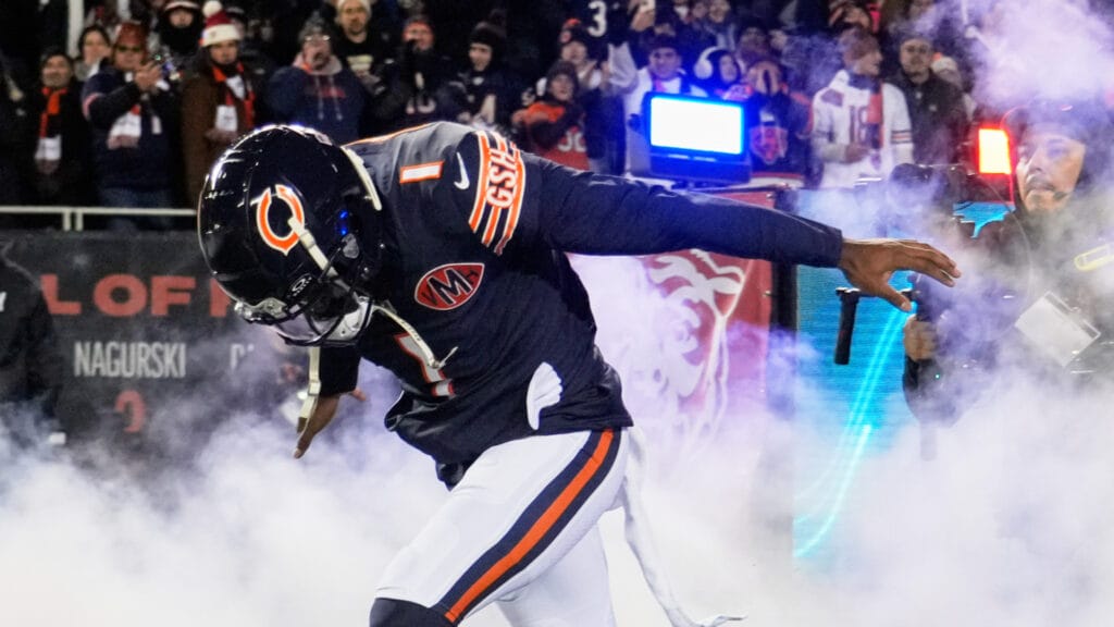 Dec 20, 2025; Chicago, Illinois, USA; Chicago Bears cornerback Jaylon Johnson (1) runs onto the field during player introductions before the game against the Green Bay Packers at Soldier Field. Mandatory Credit: David Banks-Imagn Images