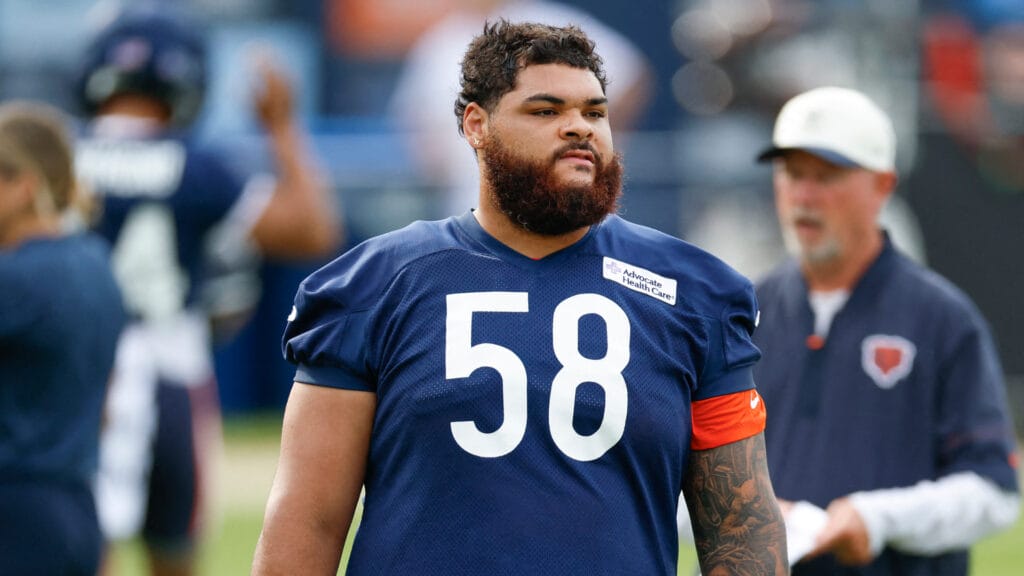Jul 31, 2026; Lake Forest, IL, USA; Chicago Bears offensive tackle Darnell Wright (58) walks on he field during Training Camp at Halas Hall. Mandatory Credit: Kamil Krzaczynski-Imagn Images