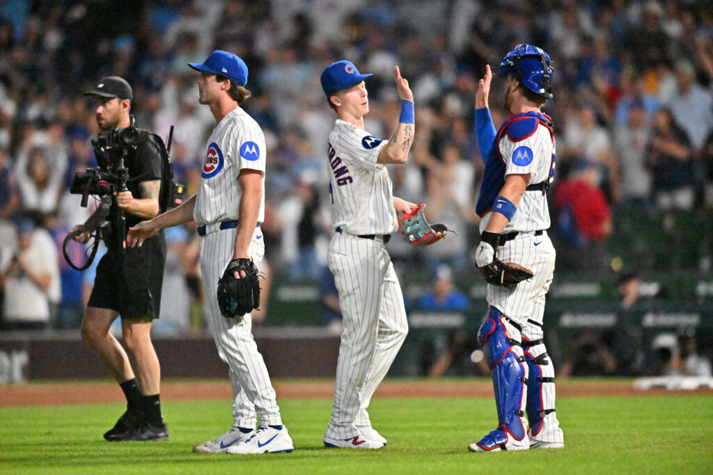 Aug 3, 2026; Chicago, Illinois, USA; Chicago Cubs center fielder Pete Crow-Armstrong (4) celebrates with catcher Carson Kelly (15) after defeating the Los Angeles Dodgers at Wrigley Field.