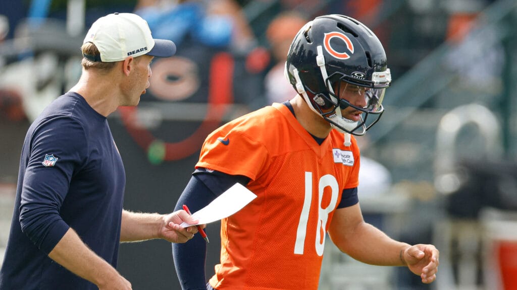Jul 31, 2026; Lake Forest, IL, USA; Chicago Bears head coach Ben Johnson talks to quarterback Caleb Williams (18) during Training Camp at Halas Hall. Mandatory Credit: Kamil Krzaczynski-Imagn Images