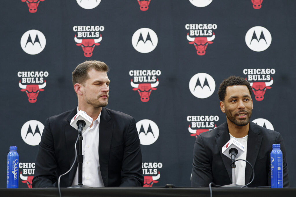 Jun 17, 2026; Chicago, Il, USA; Chicago Bulls Executive Vice President of Basketball Operations Bryson Graham (R) introduces Chicago Bulls new head coach Tiago Splitter (L) during a press conference at Advocate Center.