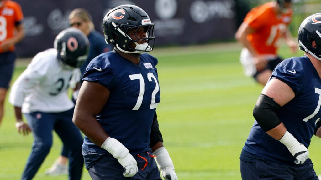 Jul 31, 2026; Lake Forest, IL, USA; Chicago Bears offensive tackle Kiran Amegadjie (72), offensive tackle Theo Benedet (79) and offensive lineman Logan Jones (54) warm up during Training Camp at Halas Hall. Mandatory Credit: Kamil Krzaczynski-Imagn Images